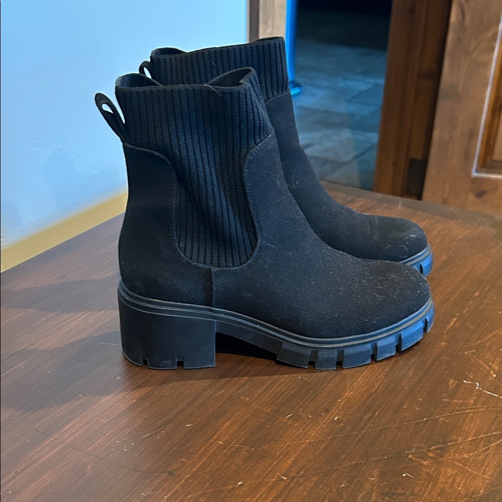 Black ankle booties. Stretch elastic top